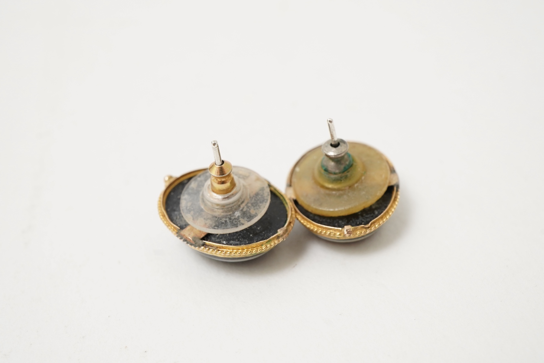 An onyx dress ring and pair of earrings